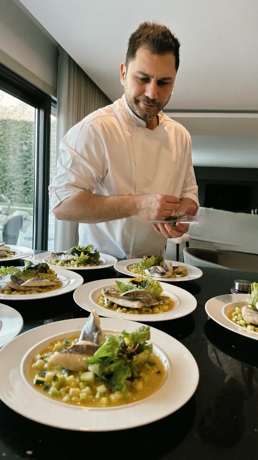 Chef Hakan Öztaç plating fish courses